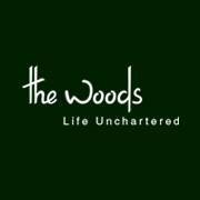 The Woods Resorts logo